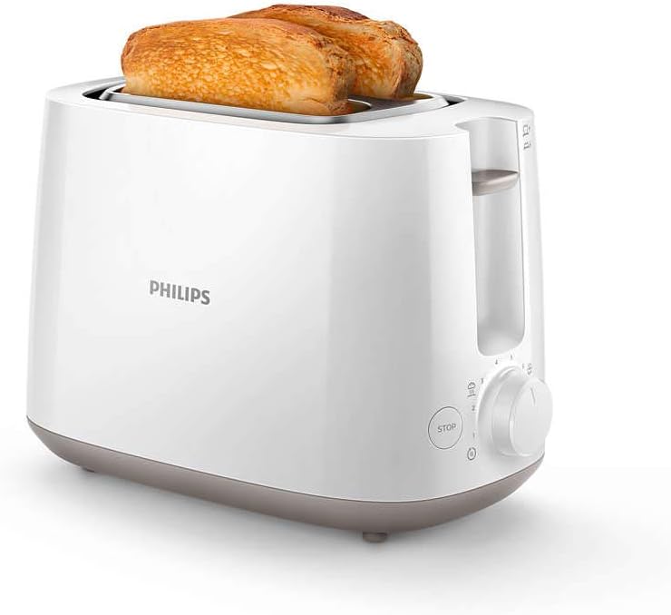 Angled view of the PHILIPS HD2581/01 toaster with bread inserted