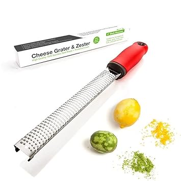 Stainless Steel Cheese and Citrus Zester Grater with Extra Sharp Blade Perfect for Lemons Parmesan Garlic Chocolate Spice Up any Kitchen Dish in Seconds with Your Premium Hand Held Shredder-Red