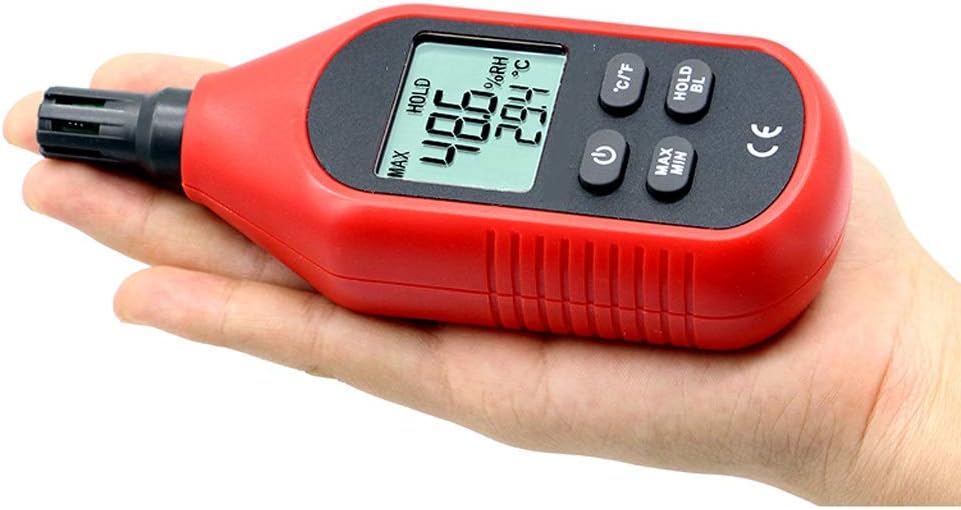 Dntum Handheld Thermo-Hygrometer held in a hand, showing its compact size