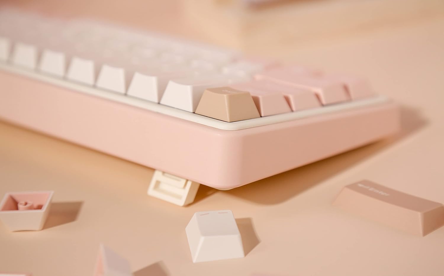 Side view of Varmilo Minilo VXT67 keyboard, showing the adjustable feet in a folded position.