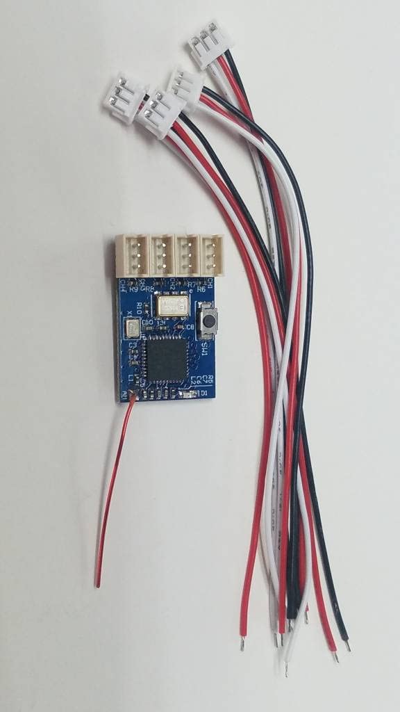 Top view of DasMikro DSK-130 V1 receiver showing channel ports and bind button