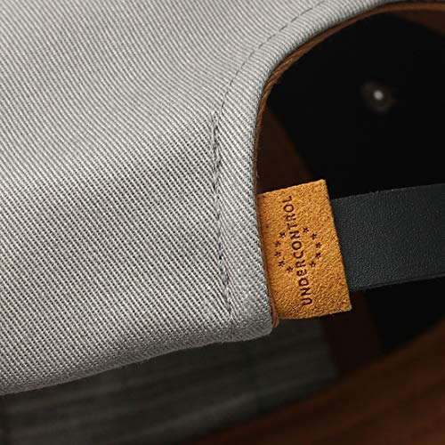 Gorra ajustable de piel gris con avión bordado que no deforma tu peinado 7