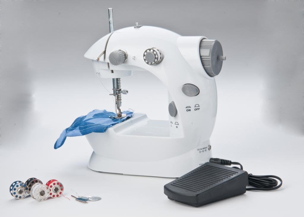 Sunbeam Mini Portable Sewing Machine AC Adapter Foot Pedal And Over 75 Piece Sewing Kit Included, Drop In Bobbin For Easy Set Up, Double Thread and Speed, Pre Threaded Ready To Use, Battery Operated As Well