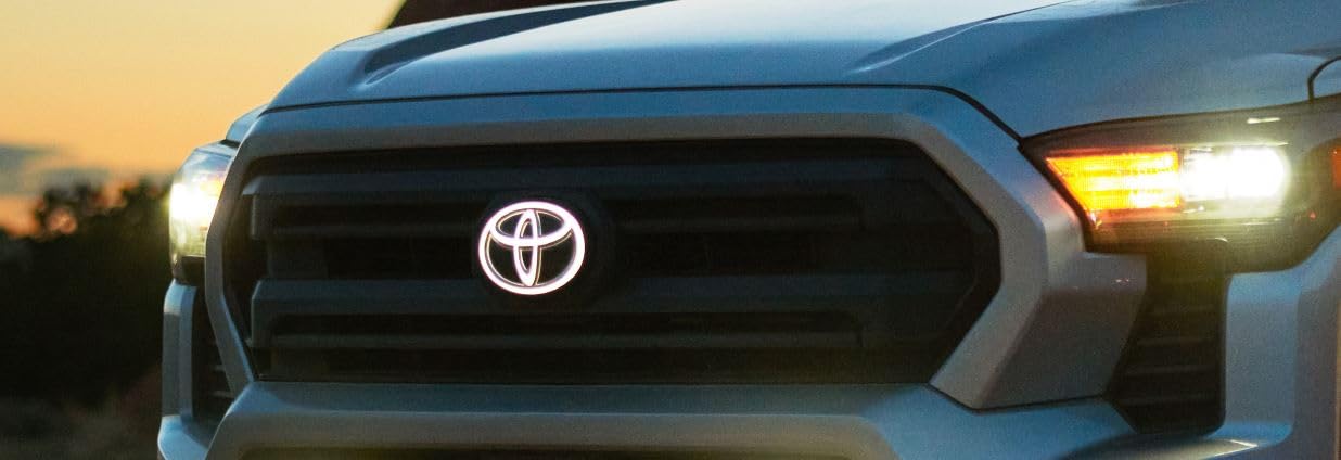 Photo 1 of Toyota LED Lighted Front Grille Emblem, Dark Chrome, for 2024+ Tacoma TRD Sport and Off-Road Models