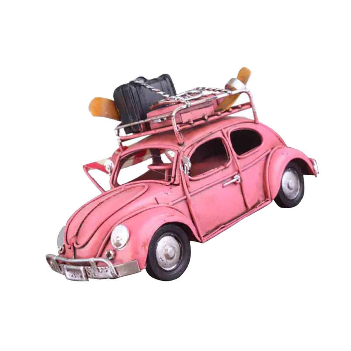 Coche de hierro vintage para eliminar la monotonía visual en escritorios y estanterías sosas