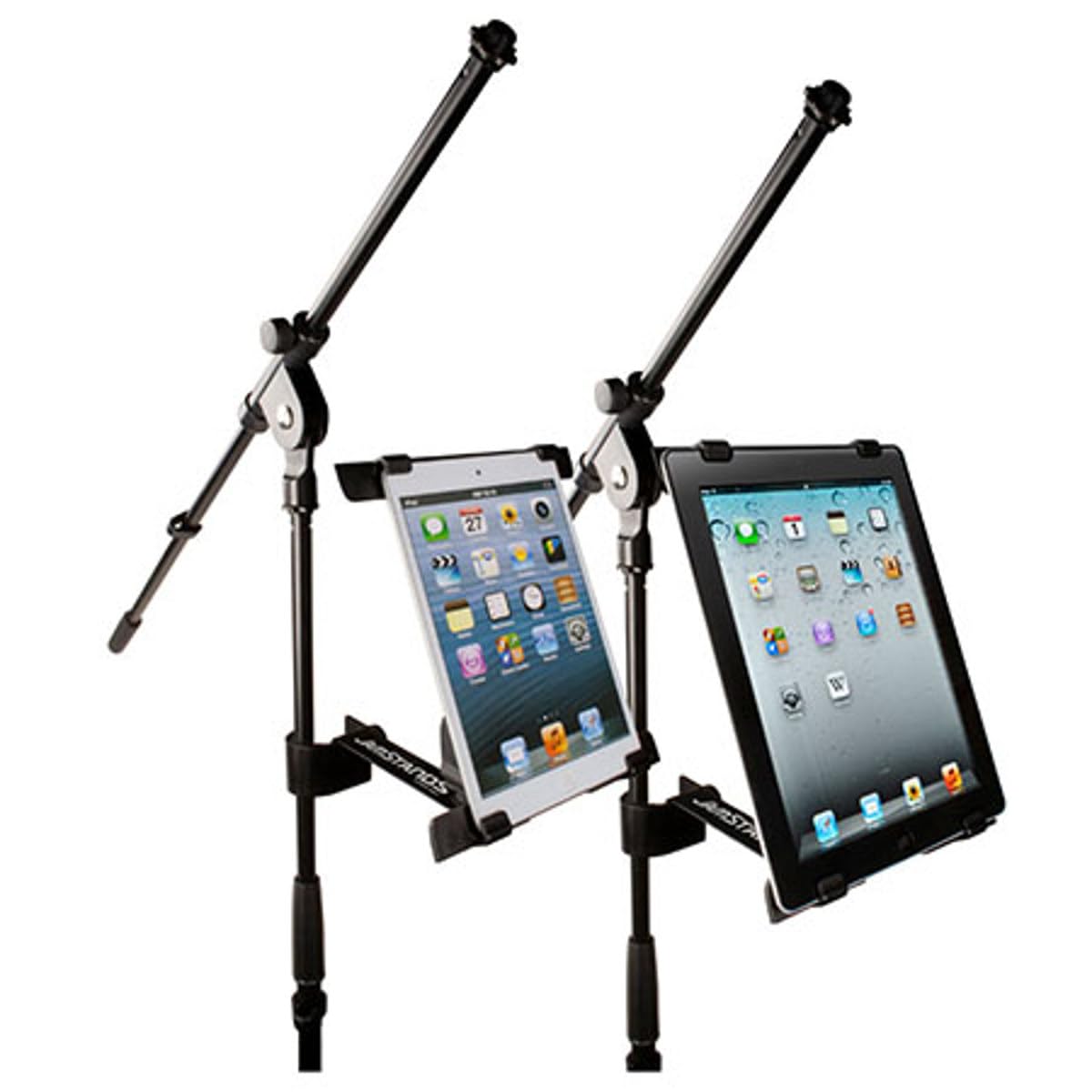 نمای نزدیک از clamp mechanism attaching to a microphone stand pole