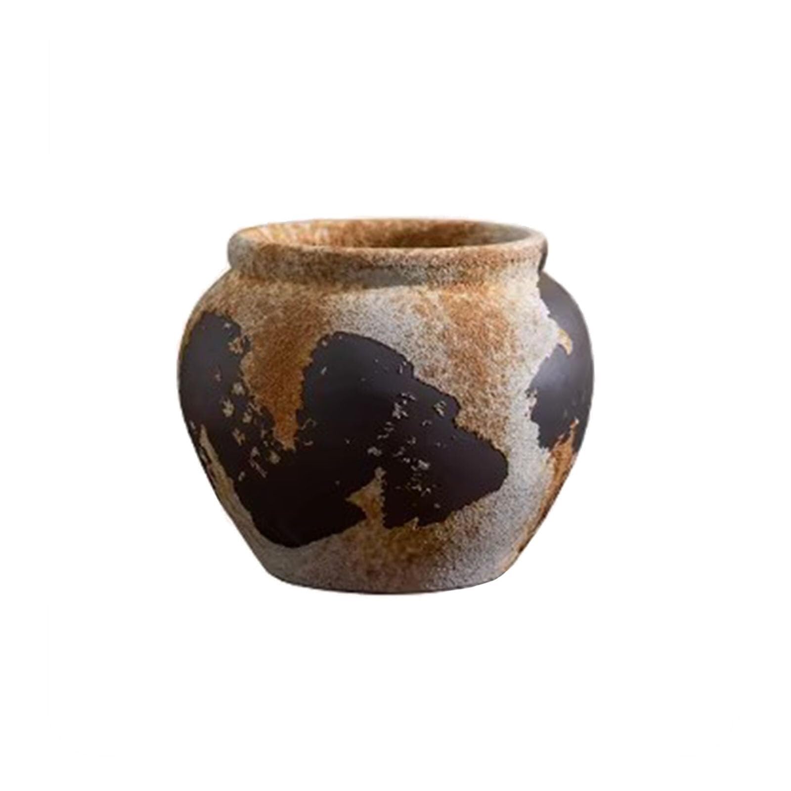 Vase en terre cuite vintage pour sublimer vos fausses fleurs d'étagère