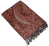 Couverture douillette design de Lorenzo Cana en 100 % laine d'agneau mérinos en brun rouge. Cette magnifique couverture au motif cachemire tissé est une véritable pièce de luxe qui ajoutera une touche de couleur à votre salon ou à votre jardin d'hiver. Le motif coloré de la couverture apporte une touche orientale à votre maison. La couverture en laine deviendra rapidement indispensable lors d'un pique-nique ou à la cheminée.