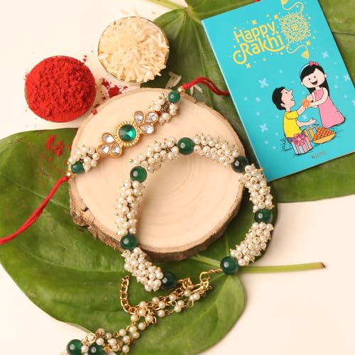 Image of Kaameri Bazaar Premium Rakhi Gift Combo for Brother & Bhabhi with Rakhi, Lumba Bracelet, ChocoKiss Cookies 75g, Trail Mix 35g, Choco Coated Almonds 35g, Roli Chawal, Greeting Card & Gift Box