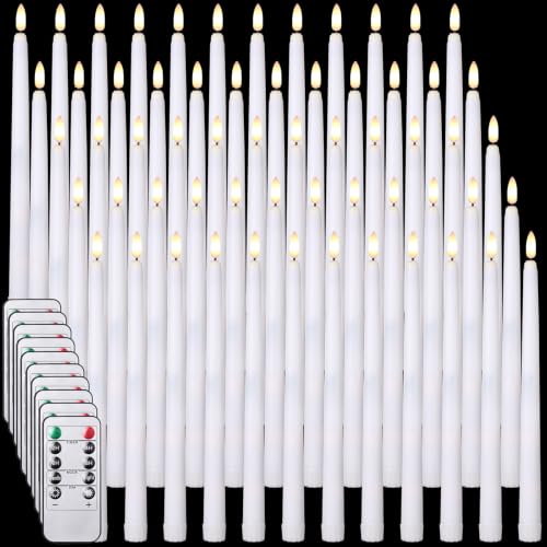 Image of Tuanse 100 Pcs Flickering Flameless Taper Candles Bulk LED Battery Operated Realistic Flame Effect with Remote & Timer Safe No Fire Wax Drip Candles for Wedding Church Home Decor (10.83 inch,White)