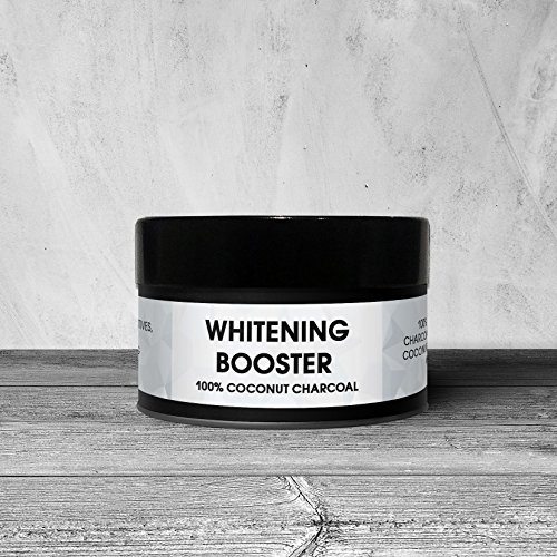 Sbiancante denti al carbone attivo. Denti bianchi