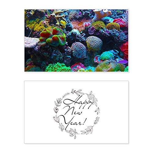 Tarjeta de año nuevo Ocean Coral con mensaje de bendición y diseño de ciencia marina