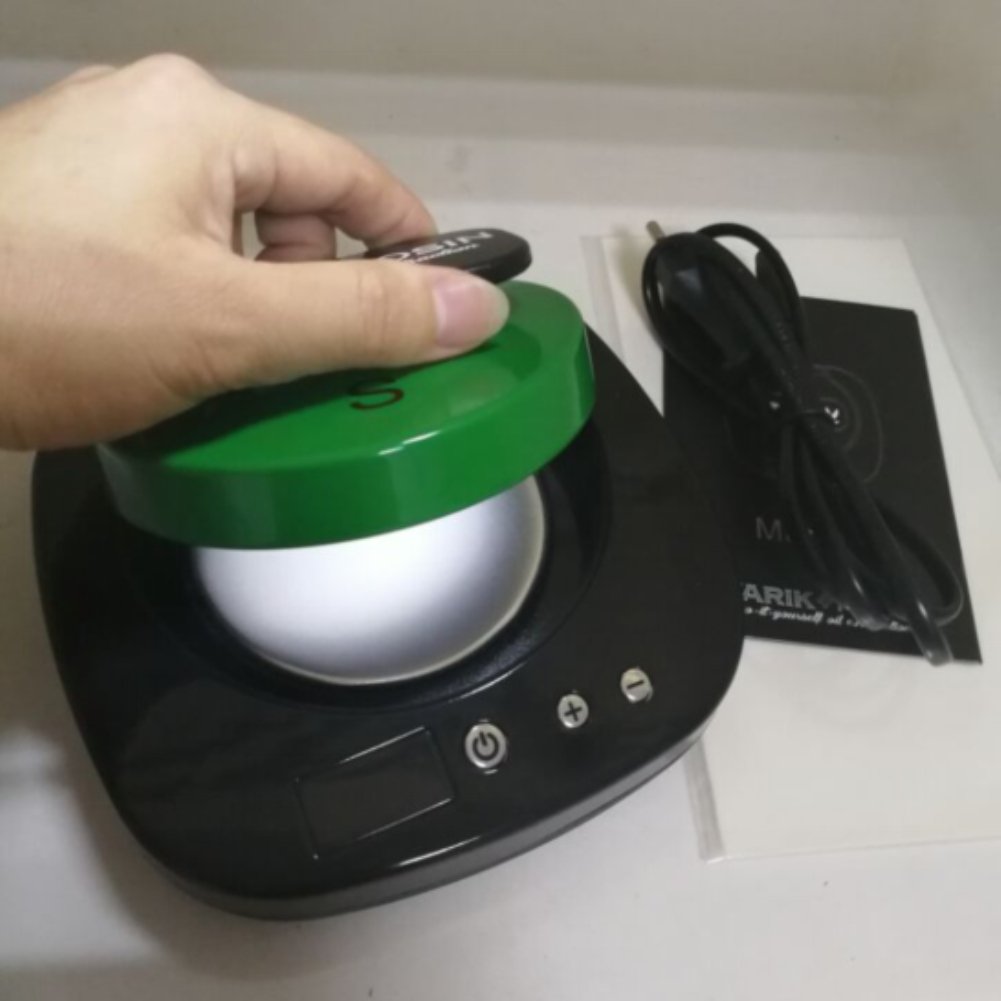 Tarik+Rosin T-Rex oil extraction machine with heating plates