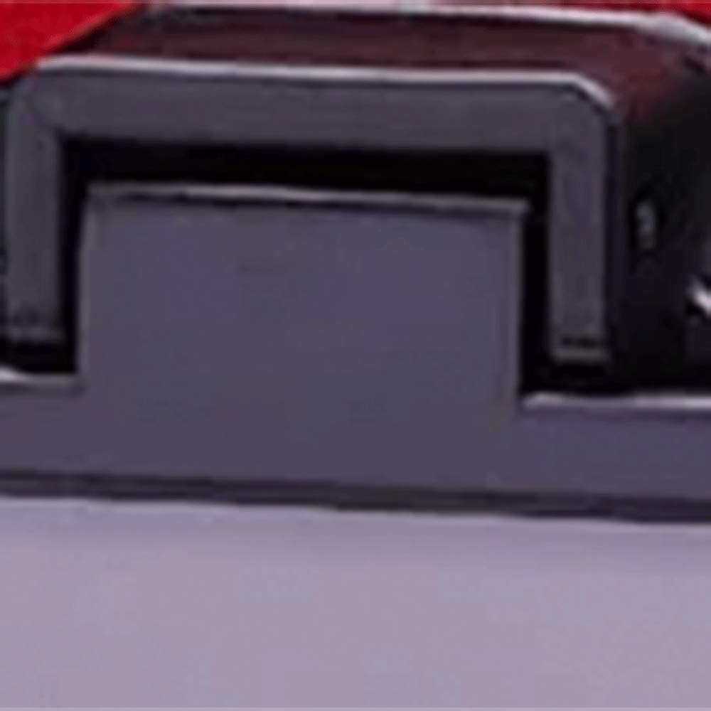 An up-close shot of a dark-colored security tag.