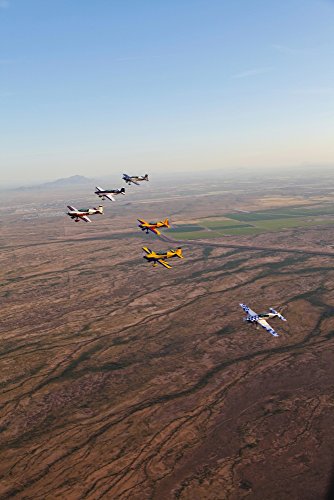 Posterazzi PSTSGR100104M Extra 300 aerobatic aircraft fly in formation during APS training in Mesa...