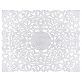 Moulures florales et bois patiné