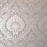 Un elegante papel pintado de damasco con elementos metálicos