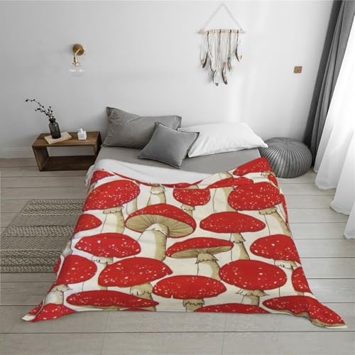 Plaid champignon rouge et blanc pour soirées cocooning sur le sofa