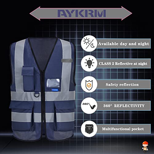 Image of safety vest for women navy blue | Navy L safety vest with reinforced pockets, clear ID holder and mic tabs for safety supervision and warehouse logistics.