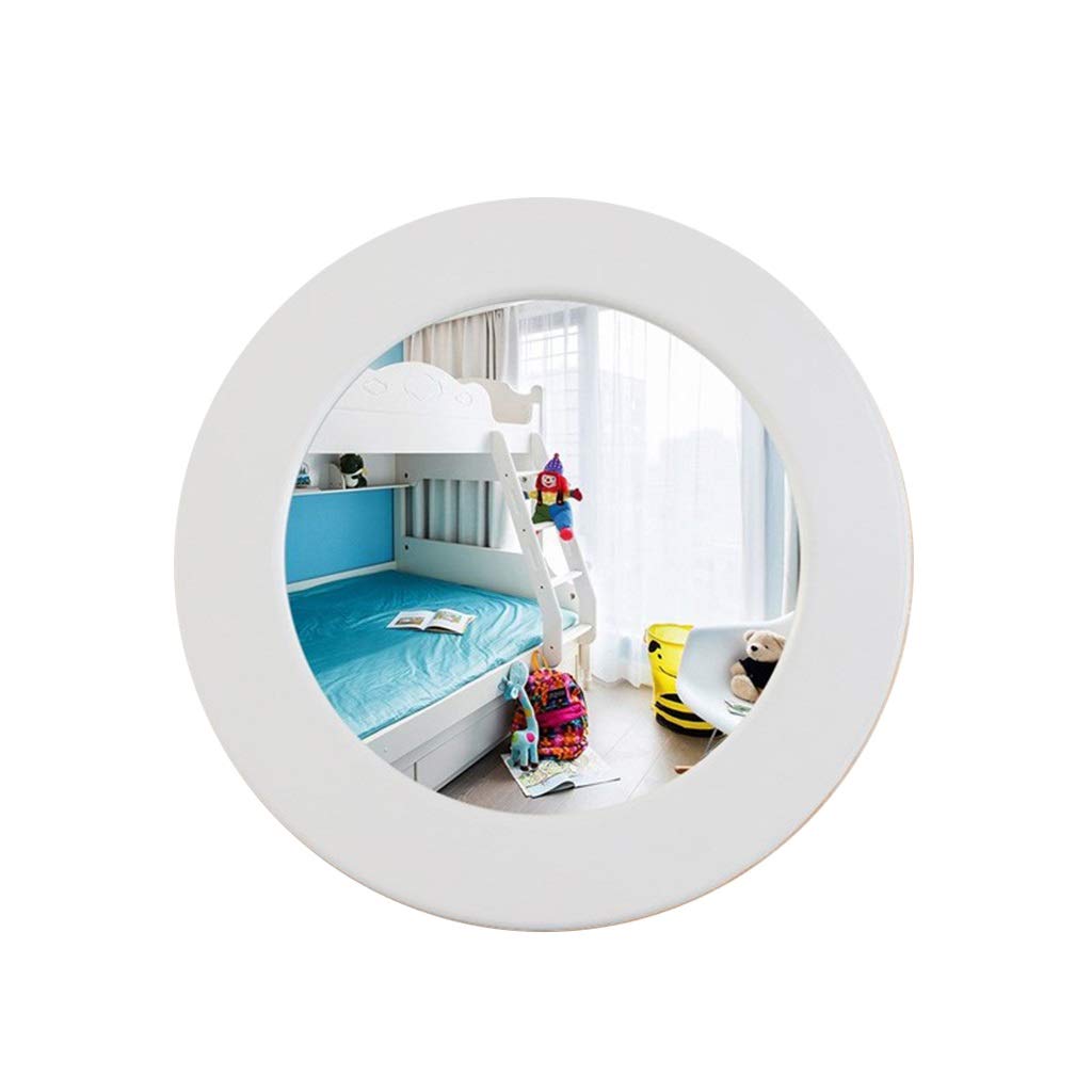 Miroir de vanité rond pour sublimer la routine beauté dans une salle de bain lumineuse