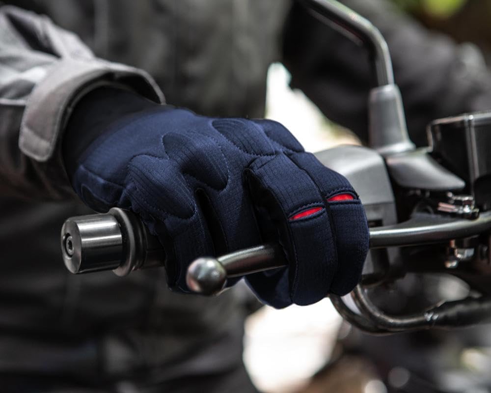 Imagem lateral da luva com fundo desfocado, sugerindo um ambiente externo. Imagem lateral da luva com fundo desfocado, sugerindo um ambiente externo.