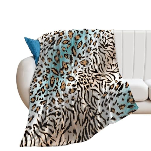 Couverture polaire léopard pour cocooner sur le canapé du salon - 2