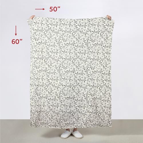 Image of Sunbeam Royal Mink Sherpa Heated Throw Electric Blanket, 50 inch x 60 inch, 4 Heat Settings, 4-Hour Auto Shut-Off, Warming Throw for Couch, Fast Heating, Machine Washable, Warm and Cozy, Grey Cape Paisley