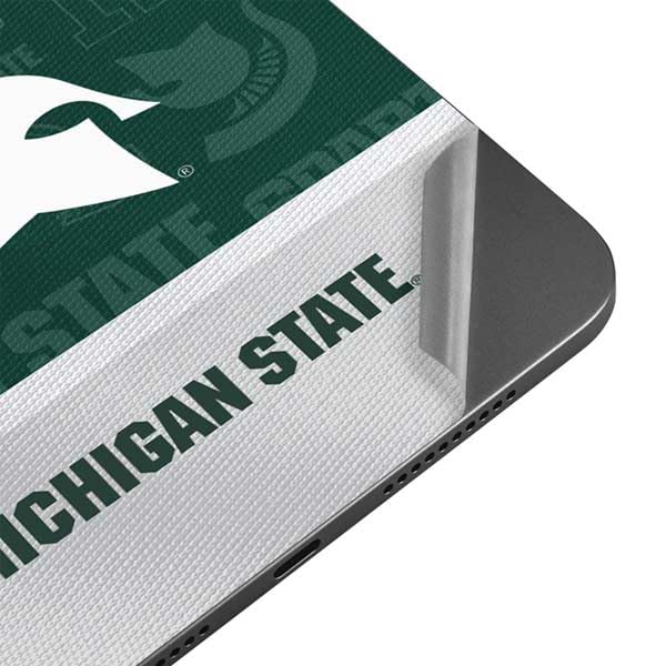 Skinit Decal Tablet Skin Compatible with iPad Mini 7 (2025) - Officially Licensed Michigan State University Jersey Split Design