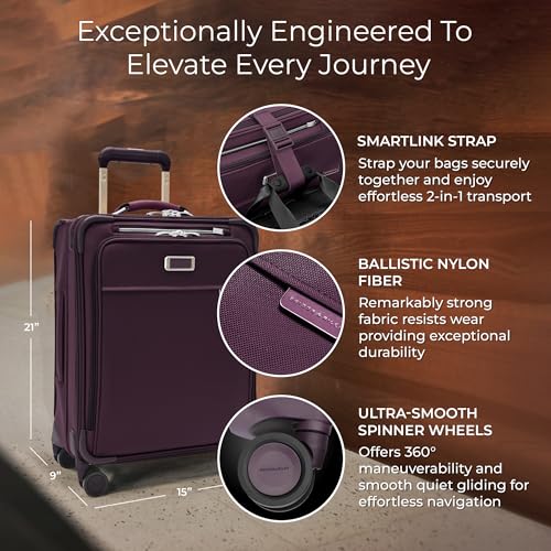 Image of Briggs & Riley 21 inch Global Carry On Expandable Spinner - Luggage for International Travel, Suitcases with Wheels, Softside Rolling Bag for Men & Women, Self-Repairing Zipper - Baseline Collection, Plum