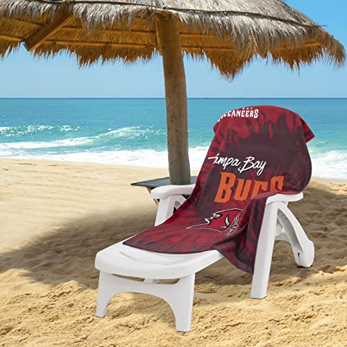Image of Northwest NFL Tampa Bay Buccaneers Unisex-Adult Beach Towel, 30 inch x 60 inch, Psychedelic