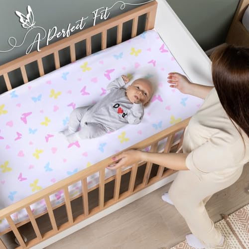 Image of UOMNY Crib Sheet Set for Girls,Butterfly Fitted Crib Sheets Baby Sheet Set for Standard Crib and Toddler mattresses Nursery Bedding Sheet for Girls 2 Pack Pink,Purple Pattern