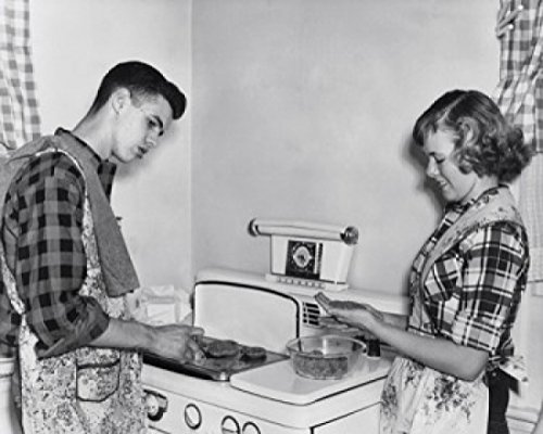 Teenage Couple Cooking Hamburgers Poster 24x36