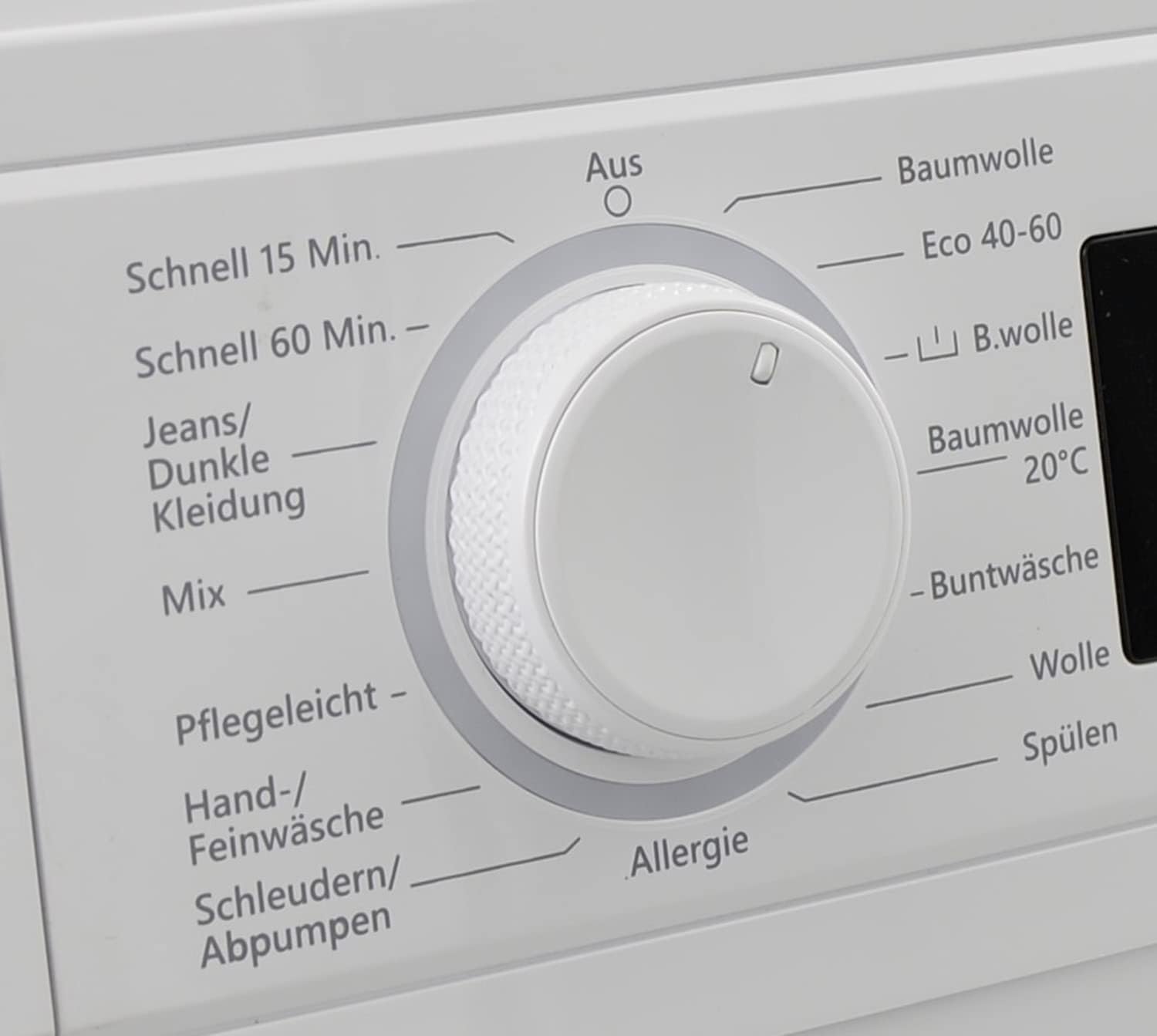Close-up of washing machine control panel