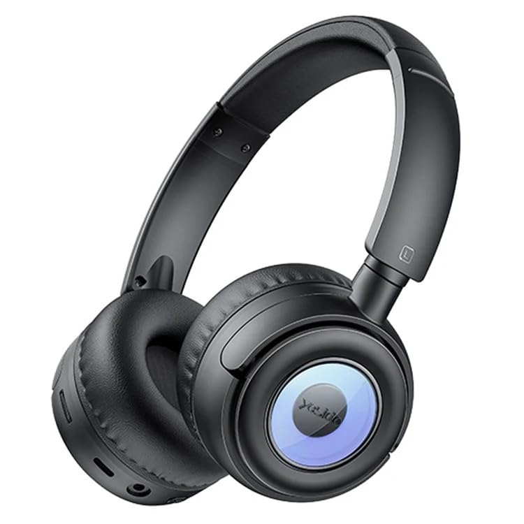 Person wearing black YESIDO EP06 headphones while gaming on a laptop, highlighting the stable Bluetooth 5.3 connection.
