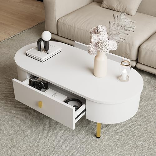 Mesa de centro con dos cajones. asas y patas doradas. esquinas curvadas
