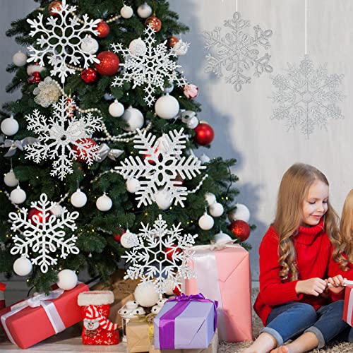 Copos de nieve plateados MIAHART de 12 pulgadas para decorar ventanas y árboles de Navidad 8