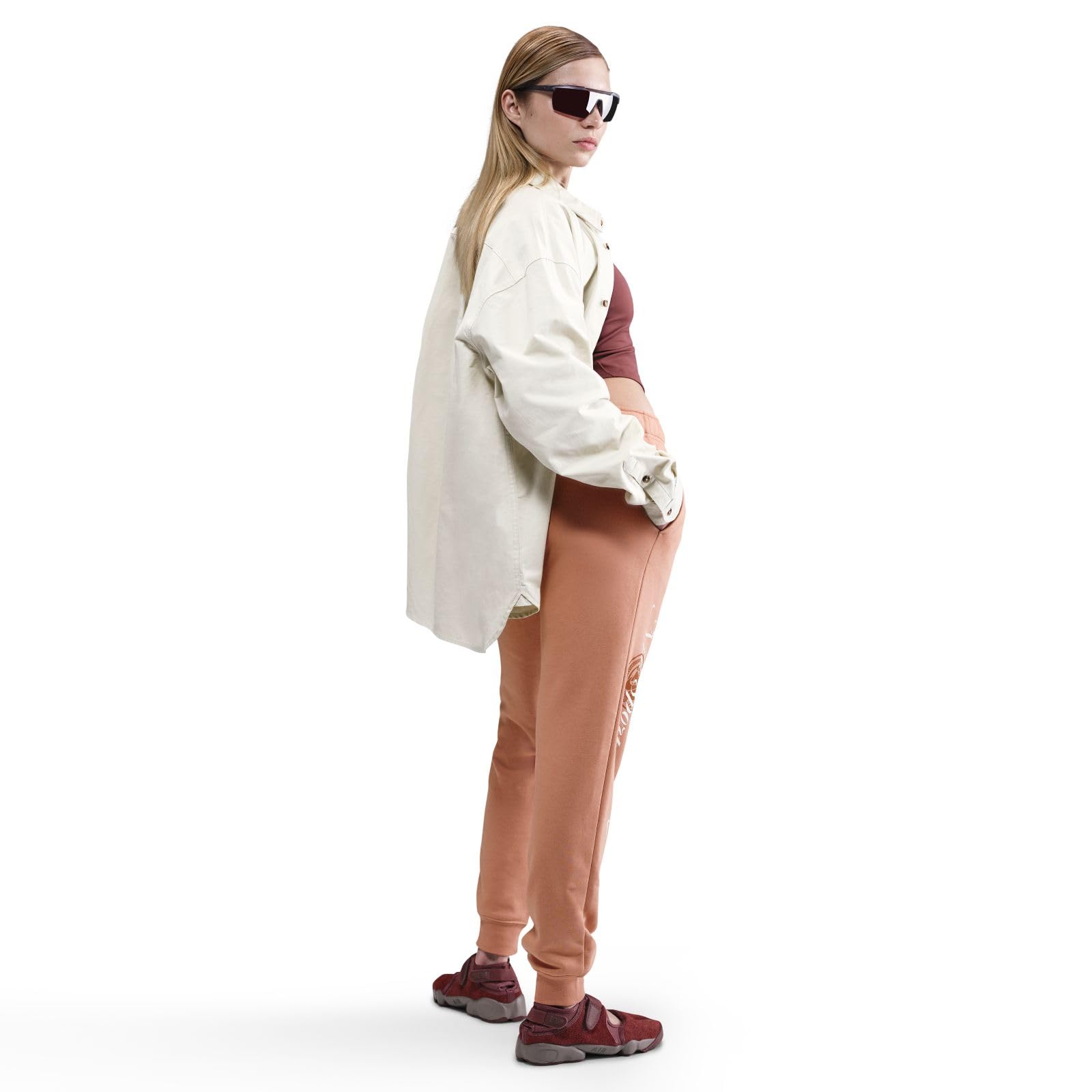 NIKE Nike Sportswear Club Fleece Hose Mit Mittelhohem Bund Und Grafik Für Damen - Spodnie Kobiety