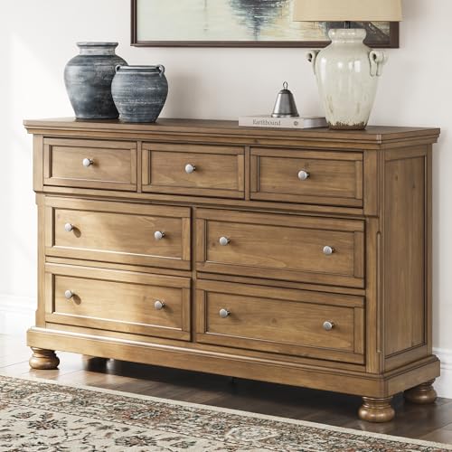 Image of Signature Design by Ashley Glarrison Dresser for Bedroom, 7 Drawer Dresser with Hidden Jewelry Tray, Poplar Solids Pine Veneer and MDF Substrate, Classic Master Suite Storage, Medium Brown