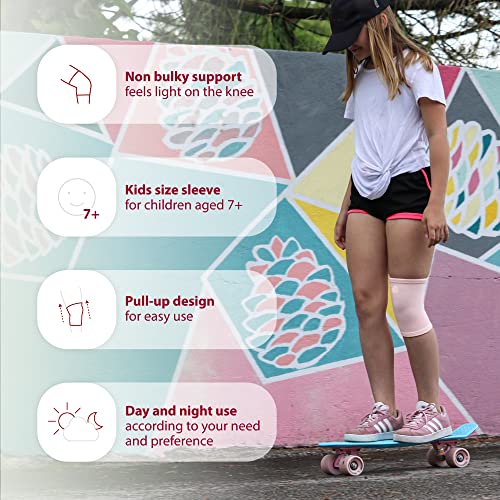 Image of KARM Kids Knee Brace Sleeve - Youth Knee Compression Sleeve for Kids, Child - Support for Pain, Sports, Football, Basketball, Gymnastics, Recovery, Boys & Girls (Light Pink)