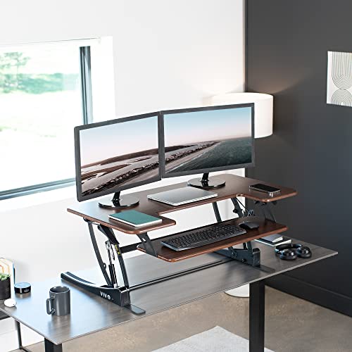 Image of VIVO Dark Walnut 42 inch Standing Desk Converter, DESK-V000VLD | Height Adjustable, Stand Up Desk Riser, Wide Keyboard Tray, Dual Monitor and Laptop Workstation, Black Frame, V Series