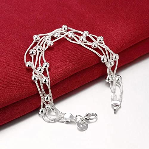 Bracelet de perles de cinq lignes pour habiller le poignet de la mariée