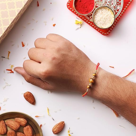 Image of Shubhanjali Crystal Beads Rakhi for Brother | Handmade Healing Crystal Stone Designer Rakhi for Bhaiya | Raksha Bandhan Gift Set with Roli Chawal, Kumkum, Greeting Card & Potli