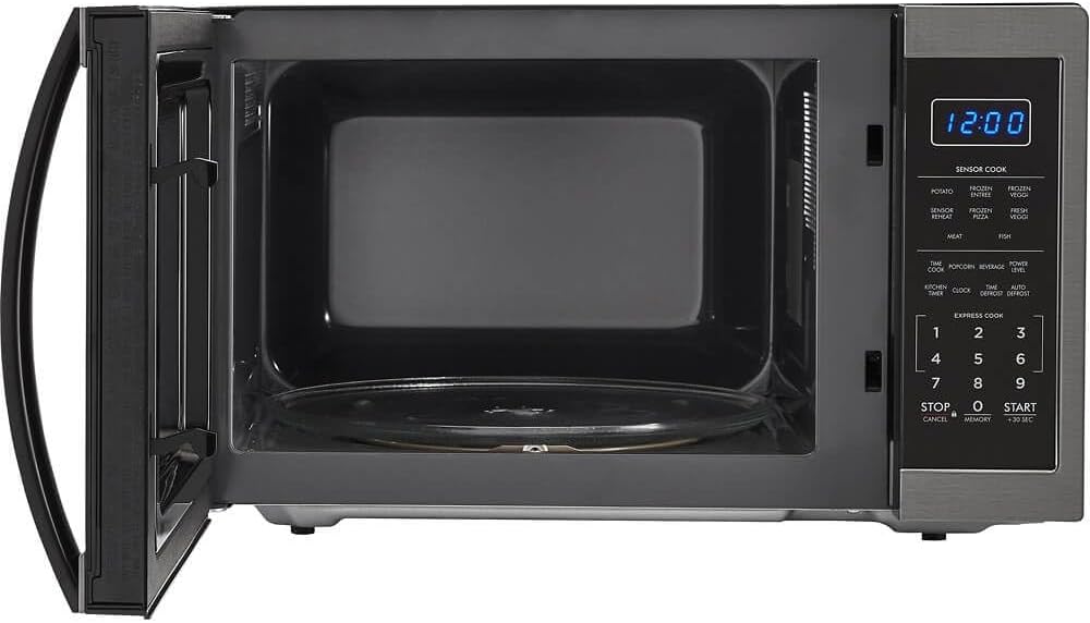Sharp 1.4 cu. ft. 1100W Countertop Microwave Oven with door open, showing interior and turntable