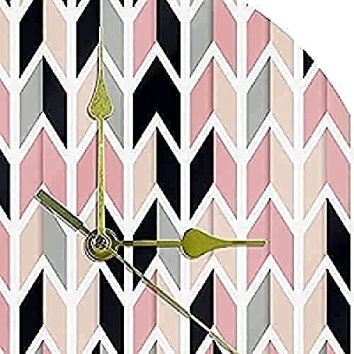 Horloge en géométrie acrylique rose aux finitions épurées