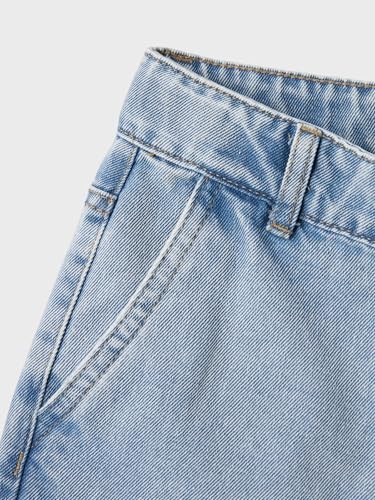 Vaqueros holgados con bolsillos para niñas que buscan comodidad y moda actual 6