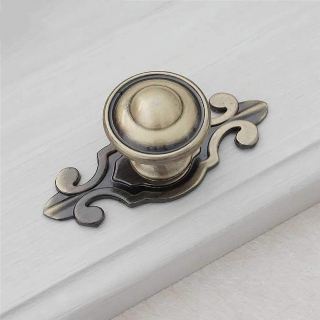 Poignée de porte vintage en bronze pour sublimer la décoration de votre salon