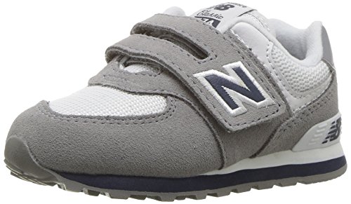 Image of New Balance Kid's 574 V1 Hook and Loop Sneaker, Grey /Navy, 3.5 W Big Kid (8-12 Years)