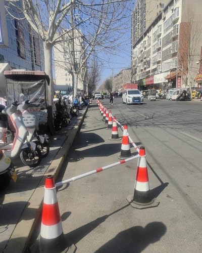 Cônes de signalisation rétractables noirs et barrière de sécurité 2m