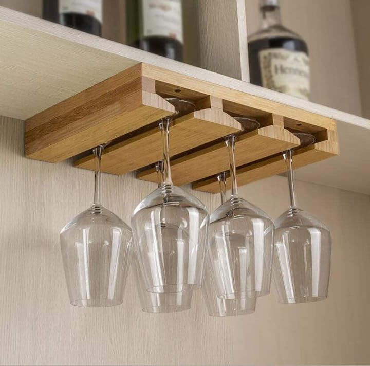 NOLAKH natural beauty A hanging glass rack made of nature wood is the perfect solution. These racks offer a stylish and space-saving way to store your wine glasses, stemware,