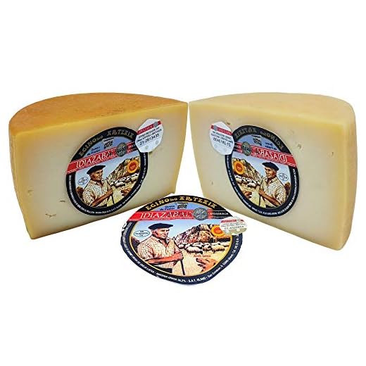 Queso Idiazabal Ahumado (Medio Queso) + Queso Idiazabal Blanco (Medio Queso) Lo Mejor de la Denominación de Origen Elaboración Artesanal - Elaborado con Leche cruda de Oveja Latxa